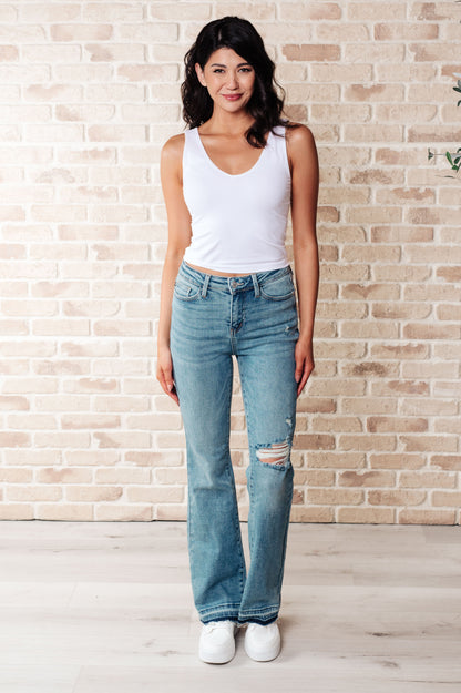 Judy Blue • Isla • Mid Rise Distressed Released Hem Bootcut Jeans