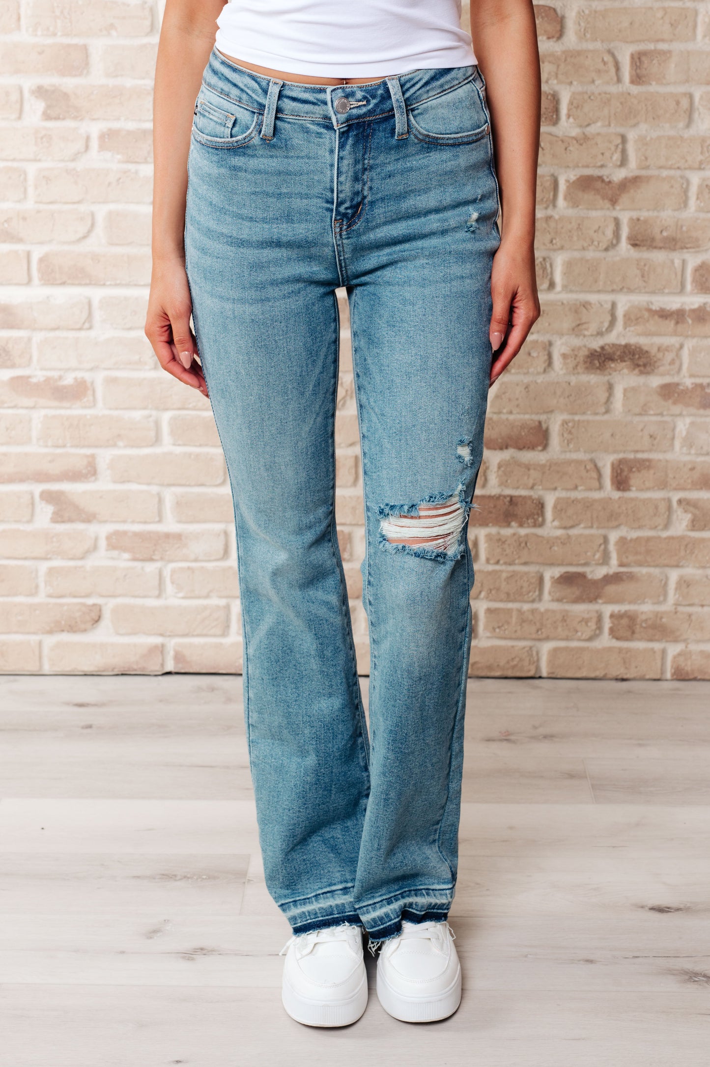 Judy Blue • Isla • Mid Rise Distressed Released Hem Bootcut Jeans