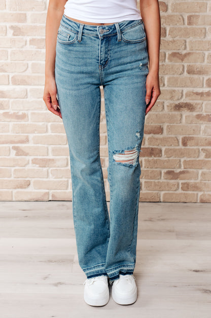 Judy Blue • Isla • Mid Rise Distressed Released Hem Bootcut Jeans