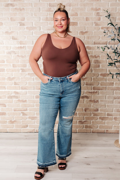 Judy Blue • Isla • Mid Rise Distressed Released Hem Bootcut Jeans