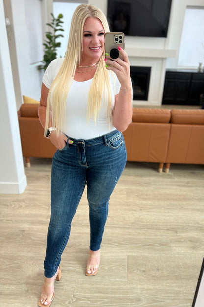 Judy Blue • Lydia Mid Rise Vintage Raw Hem Skinny Jeans