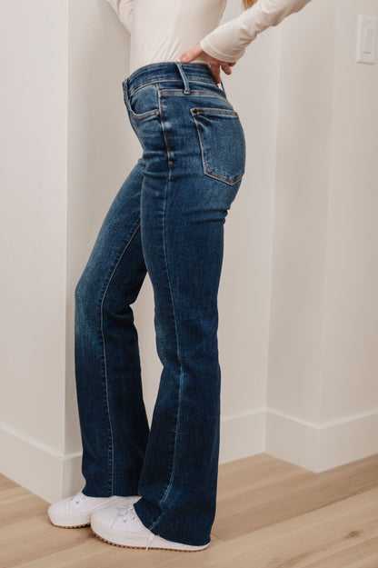 Judy Blue • Josephine Mid Rise Raw Hem Bootcut Jeans