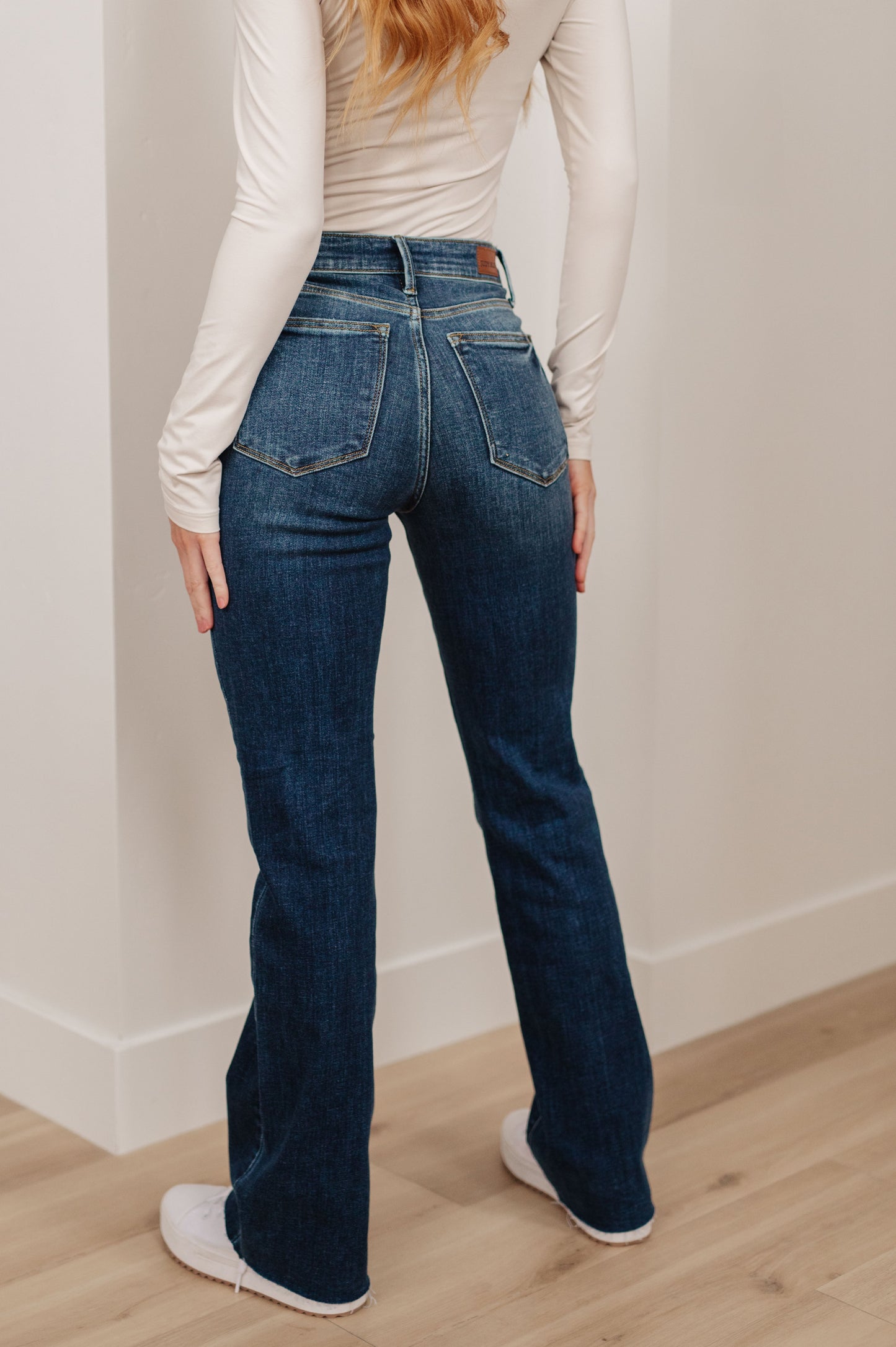 Judy Blue • Josephine Mid Rise Raw Hem Bootcut Jeans