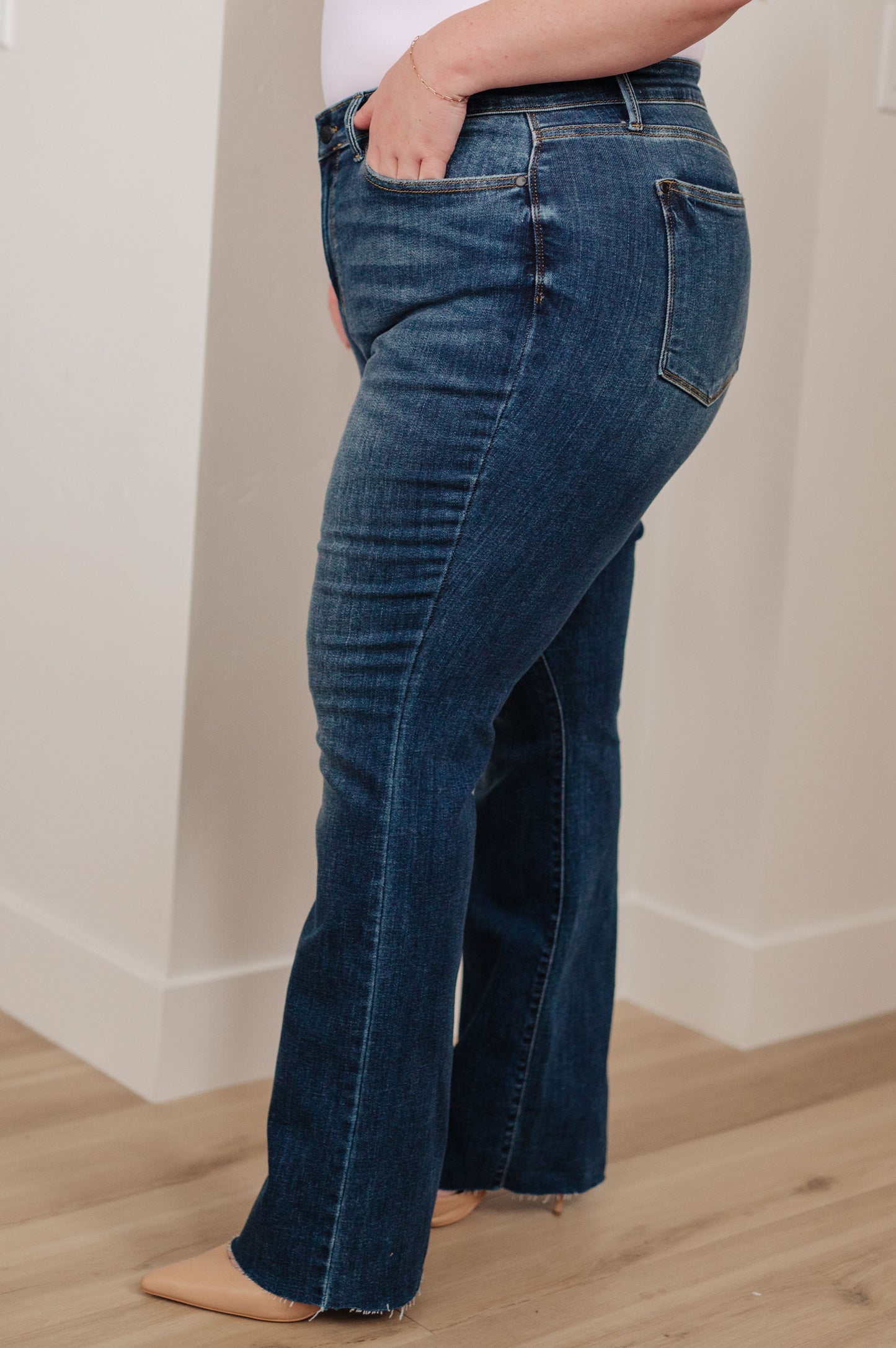Judy Blue • Josephine Mid Rise Raw Hem Bootcut Jeans