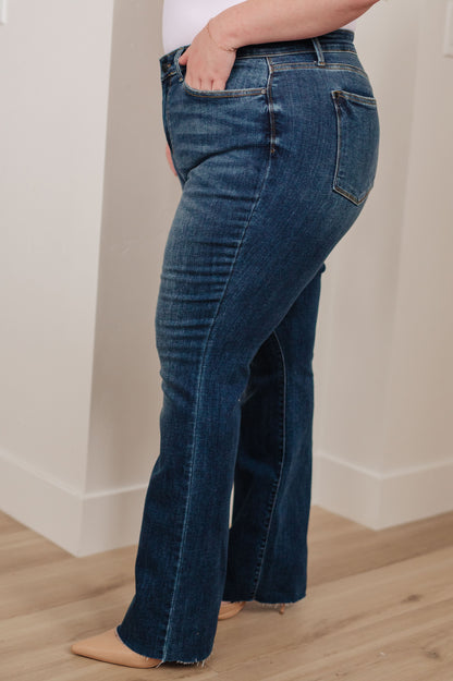 Judy Blue • Josephine Mid Rise Raw Hem Bootcut Jeans