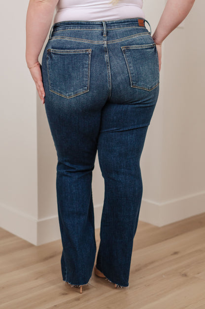 Judy Blue • Josephine Mid Rise Raw Hem Bootcut Jeans