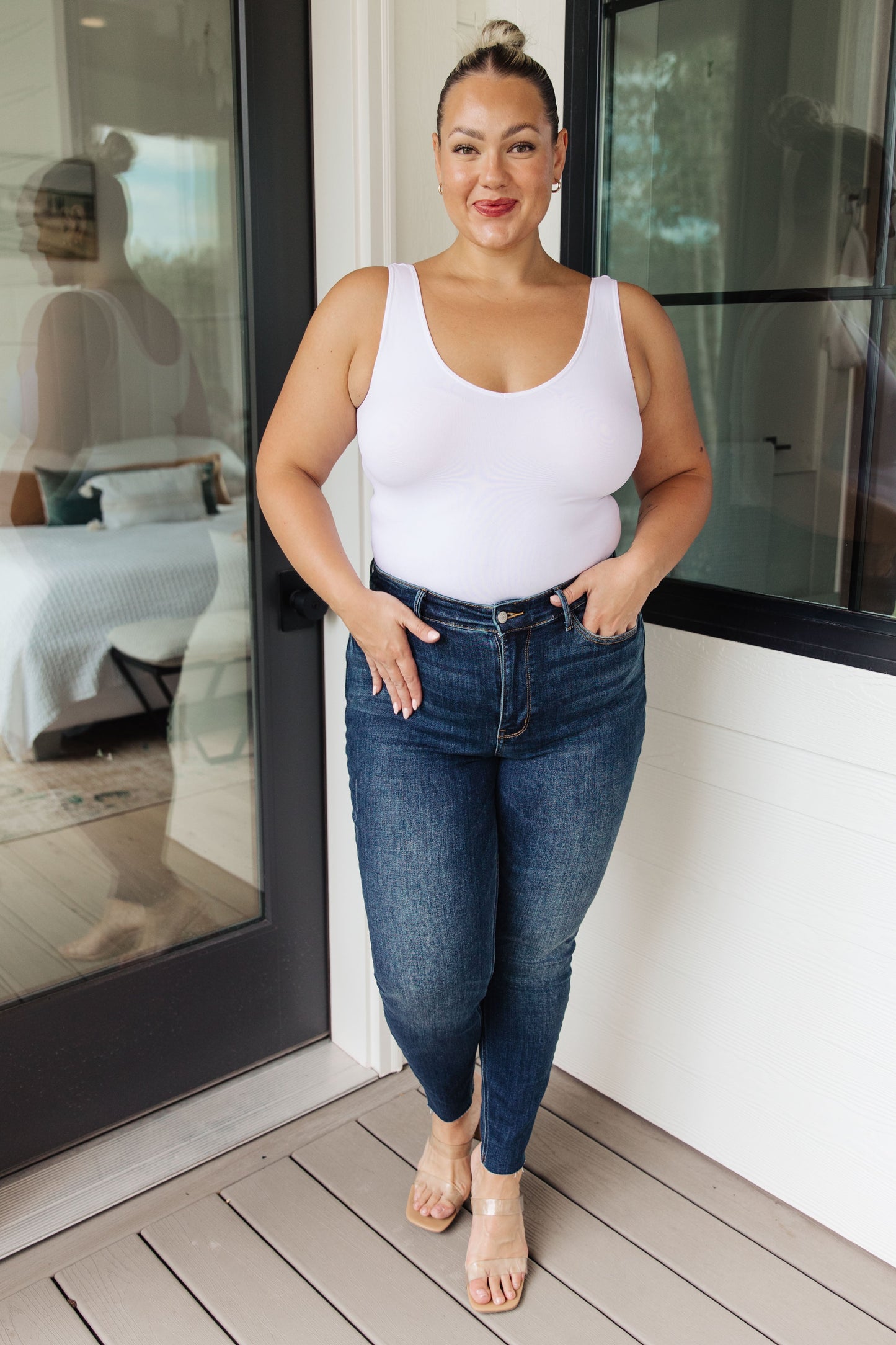 Judy Blue • Lydia Mid Rise Vintage Raw Hem Skinny Jeans